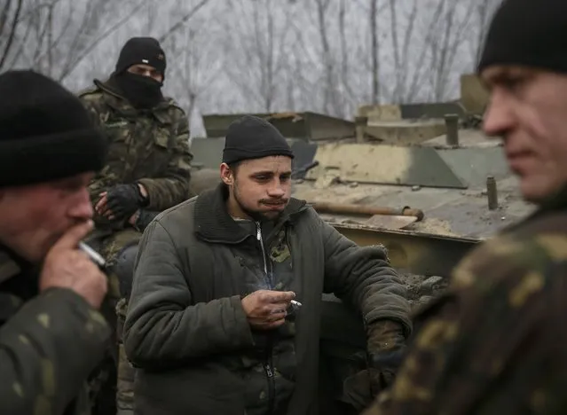 Members of the Ukrainian armed forces are seen not far from Debaltseve, eastern Ukraine February 15, 2015. (Photo by Gleb Garanich/Reuters)