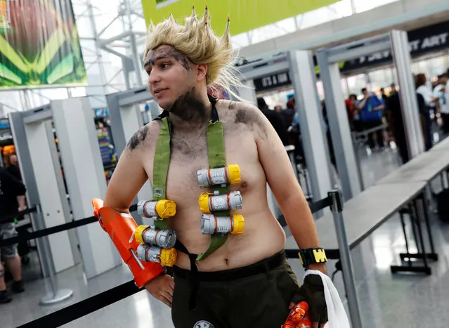 A person dressed up as Junkrat from the video game Overwatch attends the 2018 New York Comic Con in Manhattan, New York on October 4, 2018. (Photo by Shannon Stapleton/Reuters)