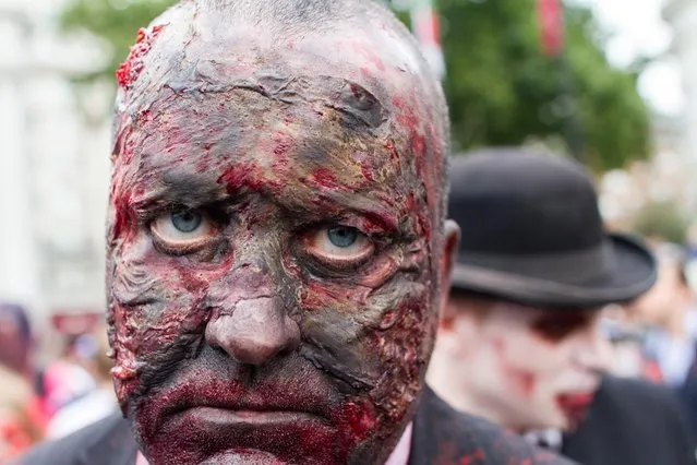 A participant pictured dressed as a zombie during World Zombie Day in London. (Photo by Michael Mba/Demotix/Corbis)