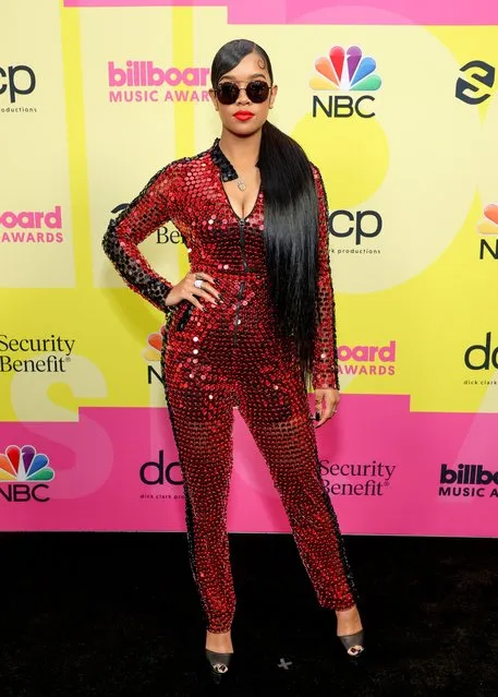 In this image released on May 23, American singer Gabriella Sarmiento Wilson, better known professionally as H.E.R. poses backstage for the 2021 Billboard Music Awards, broadcast on May 23, 2021 at Microsoft Theater in Los Angeles, California. (Photo by Rich Fury/Getty Images for dcp)