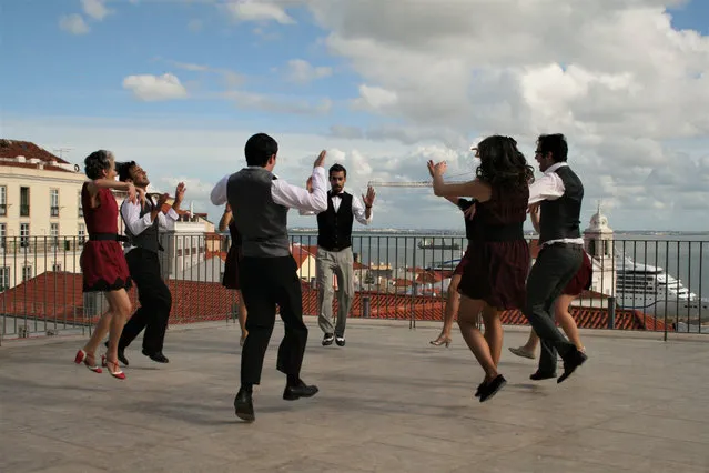 “I had just walked down from St Georges Castle, overlooking the historic centre of Lisbon, to have a coffee in the square, when this dance troop turned up for an impromptu practice. I was drawn in by their passion and tried to capture their pure joy in that moment. The feet off the ground, and the abandonment from the ordinary, made me and everyone else feel their joy too”. (Photo by Rita Long/Guardian Witness)