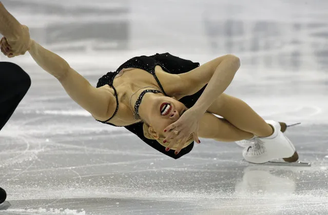 Alexa Scimeca and Chris Knierim of the United States perform during the Pairs Short Program in the ISU World Figure Skating Championship 2015 held at the Oriental Sports Center in Shanghai, China, Wednesday, March 25, 2015. (Photo by Ng Han Guan/AP Photo)