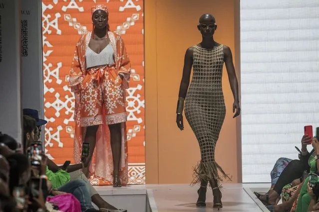 Models wear creations by Niger's designer Alia Bare during Johannesburg Fashion Week 2023 in Johannesburg, South Africa, Thursday, November 9, 2023. (Photo by Jerome Delay/AP Photo)