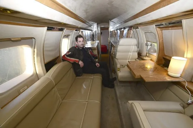 Owner Toby Rhys-Davies sits inside his luxury Jetstar private jet, built in the seventies and retaining most of the original features which is now being used as a holiday let in Redberth, Pembrokeshire, Wales, January 11, 2017. (Photo by Rebecca Naden/Reuters)