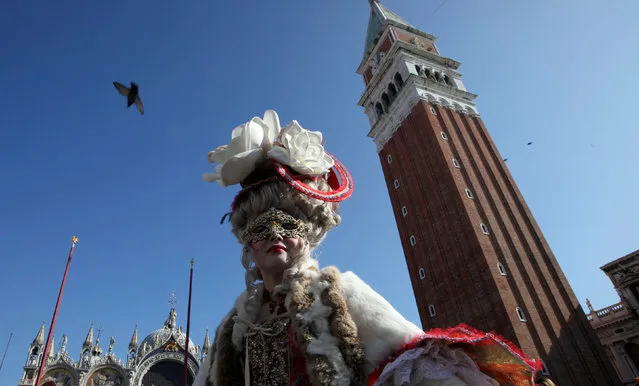 Masked reveller poses during the Carnival in Venice, Italy February 18, 2017. (Photo by Fabrizio Bensch/Reuters)