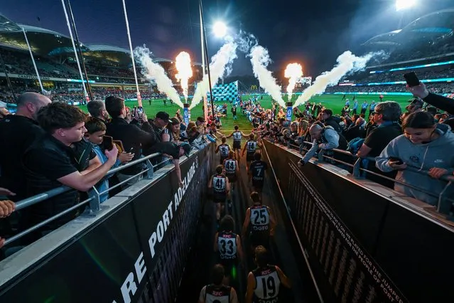 Connor Rozee of the Power leads his team out during the round four AFL match between Port Adelaide Power and Essendon Bombers at Adelaide Oval, on April 05, 2024, in Adelaide, Australia. (Photo by Mark Brake/Getty Images)