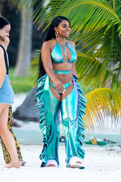Hip hop superstar Ashanti was spotted at a shoot in the Florida Keys and showed her great figure as she posed in a series of revealing bikinis on an idyllic beach on June 11, 2019. The s*xy shoot, for women's fashion line PrettyLittleThing.com, also featured  model Leslie Sidoira. (Photo by PrettyLittleThing.com/Splash News and Pictures)