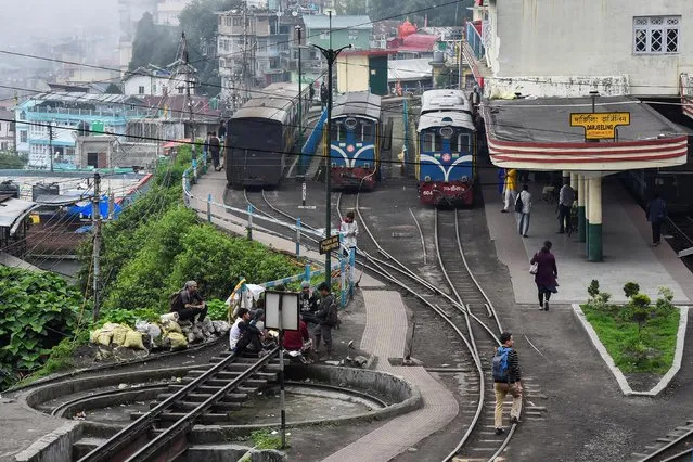 Darjeeling Himalayan Railway trains which run on a 2 foot gauge railway and is a UNESCO World Heritage Site, are seen at a station in Darjeeling, India, June 25, 2019. (Photo by Ranita Roy/Reuters)