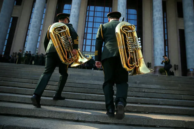 Military band members enter the Great Hall of the People before the opening session of the Chinese People's Political Consultative Conference (CPPCC) in Beijing, China, March 3, 2017. (Photo by Thomas Peter/Reuters)
