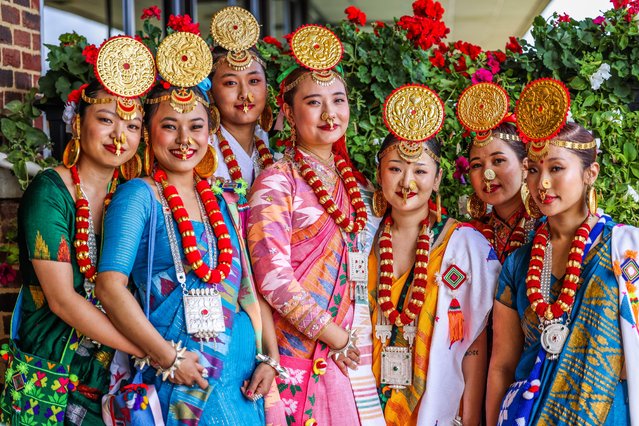 Girls in traditional costume from the Limbu People a Tibeto-Burman ethnolinguistic group indigenous to the Himalayan region of eastern Nepal in Kempton Park Racecourse Sunbury-on-Thames, Surrey, UK on August 25, 2024. (Photo by Paul Quezada-Neiman/Alamy Live News)