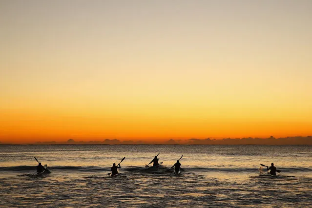 Ocean paddlers train on surf ski's at Manly Beach on July 28, 2015 in Sydney, Australia. (Photo by Cameron Spencer/Getty Images)