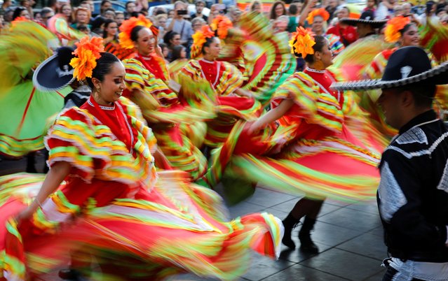 Folk dancers from Mexico participate in a folk dance festival in Bitola, North Macedonia on July 26, 2023. (Photo by Ognen Teofilovski/Reuters)