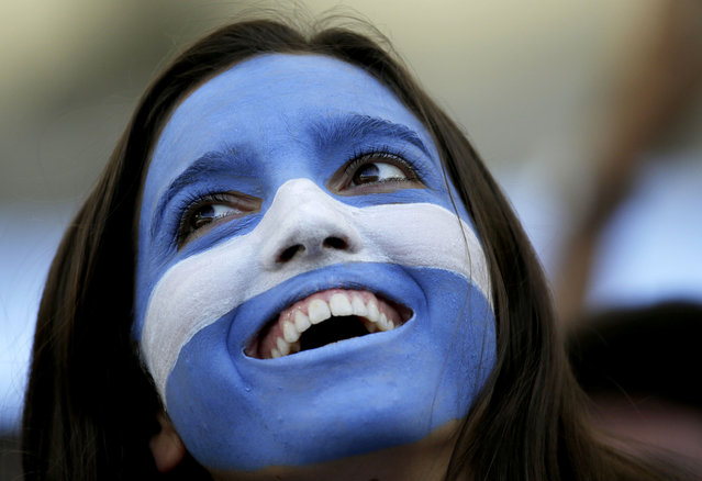 An Argentine supporter waits for the start of the World Cup final soccer match between Germany and Argentina at the Maracana Stadium in Rio de Janeiro, Brazil, Sunday, July 13, 2014. (Photo by Felipe Dana/AP Photo)