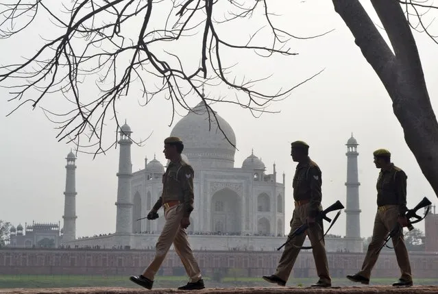 Police officers patrol outside the historic Taj Mahal, where U.S. President Donald Trump and first lady Melania Trump are expected to visit, in Agra, India, February 22, 2020. (Photo by Reuters/Stringer)