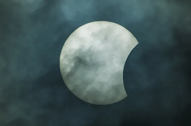 The sun as seen at 30 percent of the solar eclipse in Managua, on August 21, 2017. (Photo by Inti Ocon/AFP Photo)
