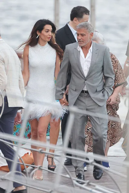 George and Amal Clooney enjoy a night out with family and friends at the Grand Hotel Tremezzo, Lake Como on July 15, 2022. Joining the party was Amal's mother Baria, sister Tala Alamuddin and George's sister Adelia Clooney. They arrived by boat and had dinner in the restaurant of the Hotel. After dinner they danced on the terrace. George and Amal, often hand in hand, looked very much in love. (Photo by Machete/The Mega Agency)