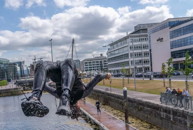 Scott Kane cools off in the Dublin Docklands on July 15, 2022. (Photo by Barry Cronin for The Irish Times)