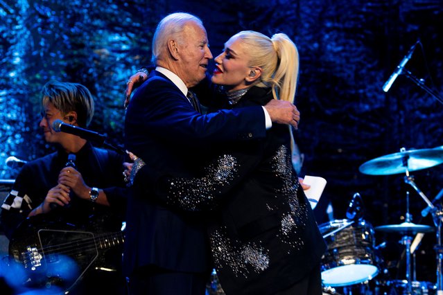President Joe Biden hugs American singer and songwriter Gwen Stefani after she performed at a welcome reception for Asia-Pacific Economic Cooperative leaders at the Exploratorium, in San Francisco, Wednesday, November 15, 2023. (Photo by Doug Mills/The New York Times via AP Photo, Pool)