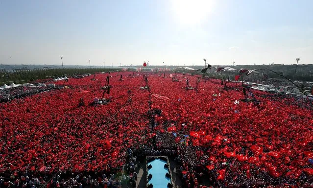 People hold Turkish flags as they take part in Democracy and Martyrs' Rally, held to protest against the July 15 failed coup by the Fetullah Terrorist Organization (FETO), at Yenikapi in Istanbul, Turkey on August 7, 2016. Turkish officials accuse U.S.-based Turkish citizen Fetullah Gulen plotting to overthrow the government of President Erdogan as the culmination of a long running campaign to infiltrate Turkish institutions including the military, the police and the judiciary. (Photo by Turkish Presidency/Yasin Bulbul/Anadolu Agency/Getty Images)