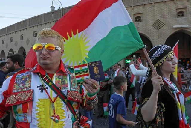 Iraqi Kurds commemorate the fifth anniversary of the Kurdistan Region's independence referendum in Arbil, on September 25, 2022. (Photo by Safin Hamed/AFP Photo)