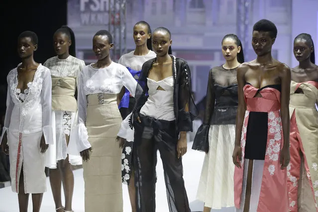 Models display creations by Ladunni Lambo during the Fashion Week in Lagos, Nigeria, Sunday, November 12, 2017. (Photo by Sunday Alamba/AP Photo)
