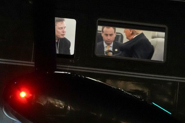 Elon Musk (L), White House Staff Secretary Will Scharf (C) and US President Donald Trump, are seen through Marine One's window as they land on the South Lawn of the White House in Washington, DC on March 9, 2025. (Photo by Oliver Contreras/AFP Photo)