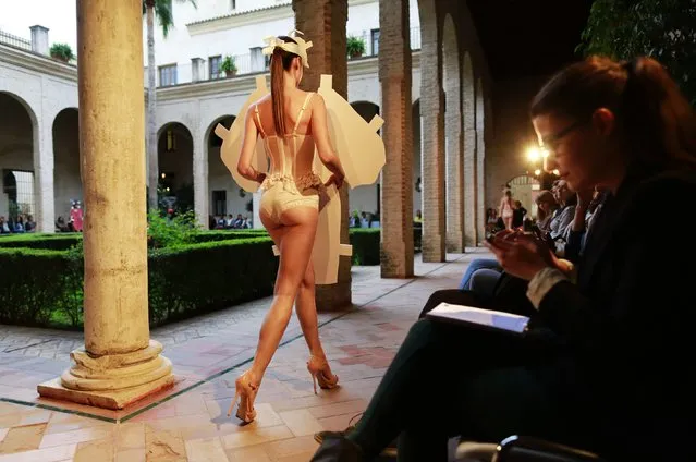 A model presents a creation by Claudina Mata during Andalucia de Moda (Andalusia Fashion) in Seville, southern Spain November 3, 2014. (Photo by Marcelo del Pozo/Reuters)