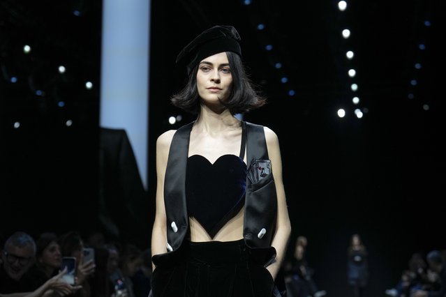 A model wears a creation as part of the Emporio Armani Fall/Winter 2025-2026 Womenswear collection presented in Milan, Italy, Thursday, February 27, 2025. (Photo by Luca Bruno/AP Photo)