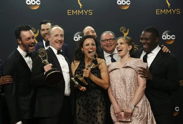 The cast and crew of “Veep” pose backstage with their award for Outstanding Comedy Series at the 68th Primetime Emmy Awards in Los Angeles, California U.S., September 18, 2016. (Photo by Mario Anzuoni/Reuters)