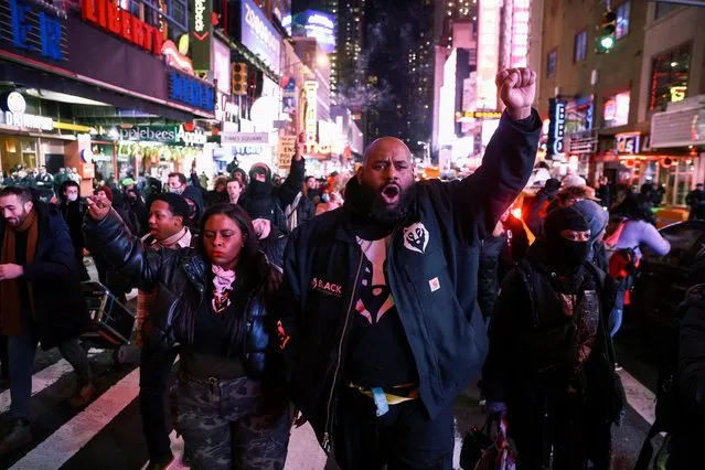 People take part in a protest on the day of the release of a video showing police officers beating Tyre Nichols, the young Black man who died three days after he was pulled over while driving during a traffic stop by Memphis police officers, at a protest in New York, U.S., January 27, 2023. (Photo by Andrew Kelly/Reuters)