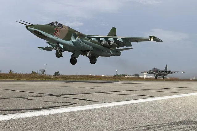 Sukhoi Su-25 fighter jets take off from the Hmeymim air base near Latakia, Syria, in this handout photograph released by Russia's Defence Ministry October 22, 2015. (Photo by Reuters/Ministry of Defence of the Russian Federation)