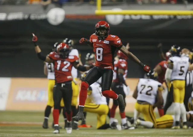 Calgary Stampeders' Fred Bennett celebrates after the Stampeders blocked a field goal attempt by the Hamilton Tiger Cats in the first half during the CFL's 102nd Grey Cup football championship in Vancouver, British Columbia, November 30, 2014. (Photo by Ben Nelms/Reuters)