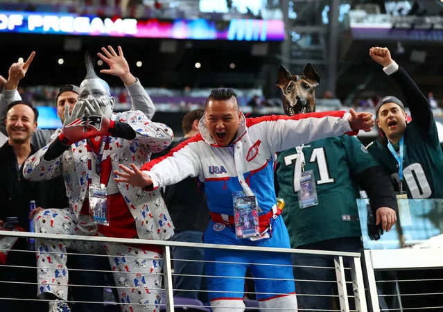 Fans of the Philadelphia Eagles and New England Patriots cheer before Super Bowl LII at U.S. Bank Stadium in Minneapolis, MN, USA on February 4, 2018. (Photo by Mark J. Rebilas/USA TODAY Sports)