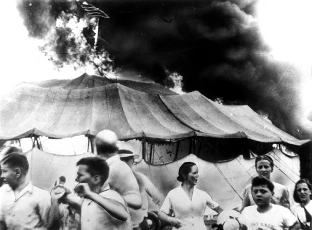 This was the scene of pandemonium at Hartford, Conn., on July 6, 1944, when a fire in which over 145 persons died, struck the tented Ringling Bros. Barnum and Bailey Circus. (Photo by AP Photo)