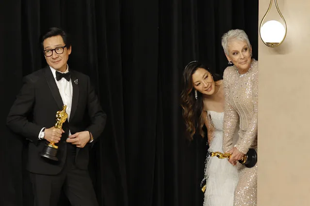 (L-R) Ke Huy Quan, winner of the Best Actor In A Supporting Role award, Michelle Yeoh, winner of the Best Actress in a Leading Role award and Jamie Lee Curtis, winner of the Best Supporting Actress award for “Everything Everywhere All at Once”, pose in the press room during the 95th Annual Academy Awards on March 12, 2023 in Hollywood, California. (Photo by Mike Coppola/Getty Images)