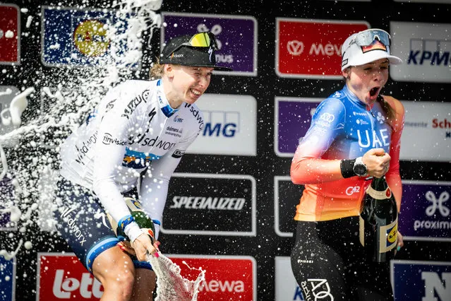 Team SD Worx' Dutch rider Lorena Wiebes (L) celebrates on the podium after she won the women's 'Scheldeprijs' one day cycling race, from Terneuzen, Netherlands to Schoten, on April 5, 2023. (Photo by Jasper Jacobs/BELGA via AFP Photo)