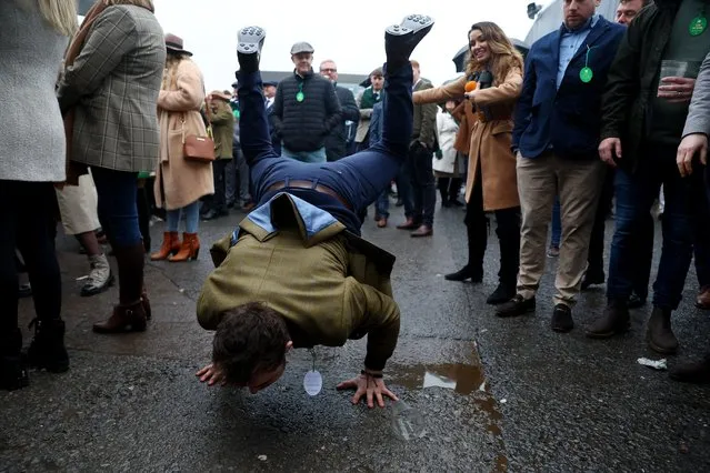 Racegoers react during the Cheltenham Festival in Cheltenham, Britain on March 16, 2023. (Photo by Paul Childs/Reuters)