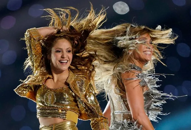 Shakira and Jennifer Lopez perform onstage during the Pepsi Super Bowl LIV Halftime Show at Hard Rock Stadium on February 02, 2020 in Miami, Florida. (Photo by Mike Blake/Reuters)