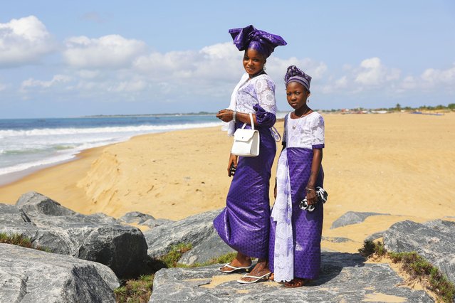A mother and daughter pose for a photo at a beach after Eid al-Adha prayers in Keta, Ghana, Friday, Jun 6, 2025. (Photo by Misper Apawu/AP Photo)