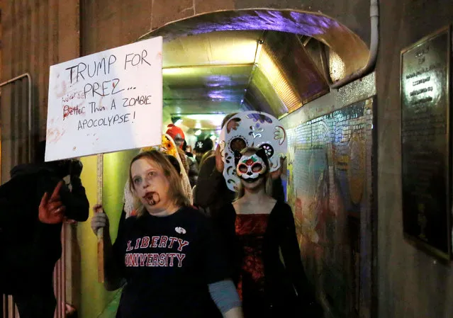 A female supporter Zombie for Trump campaigns in the annual Silver Spring Zombie Walk before Halloween in Silver Spring, Maryland, U.S., October 29, 2016. (Photo by Gary Cameron/Reuters)