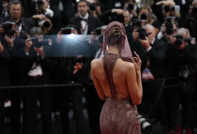 Brazilian model Alessandra Ambrosio poses for photographers upon arrival at the opening ceremony and the premiere of the film “Jeanne du Barry” at the 76th international film festival, Cannes, southern France, Tuesday, May 16, 2023. (Photo by Scott Garfitt/Invision/AP Photo)