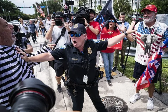 Supporters and protestors clash after a motorcade carrying former President Donald Trump arrived at his Trump National Doral resort on Monday, June 12, 2023, in Doral, FL. (Photo by Jabin Botsford/The Washington Post)