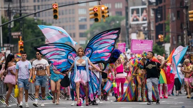 Revelers march during the NYC pride parade on Sunday, June 25, 2023, in New York. (Photo by Eduardo Munoz Alvarez/AP Photo)