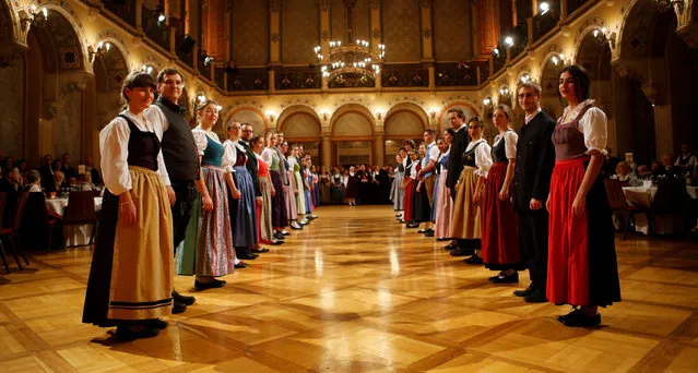 Dancers dressed in Tracht (traditional costumes) perform during the opening of the traditional Kathreintanz in Vienna, Austria, November 26, 2016. (Photo by Leonhard Foeger/Reuters)