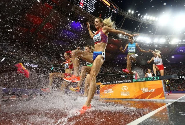 USA's Emma Coburn (C) competes in the women's 3000m steeplechase heat 2 during the World Athletics Championships at the National Athletics Centre in Budapest on August 23, 2023. (Photo by Kai Pfaffenbach/Reuters)