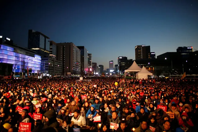 People attend a protest calling for South Korean President Park Geun-hye to step down in central Seoul, South Korea, December 10, 2016. (Photo by Kim Hong-Ji/Reuters)