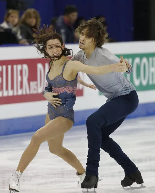 Ksenia Monko and Kirill Khaliavin of Russia perform during the Ice Dance Free Dance event in the ISU World Figure Skating Championship 2015 held at the Oriental Sports Center in Shanghai, China, Friday, March 27, 2015. (Photo by Ng Han Guan/AP Photo)