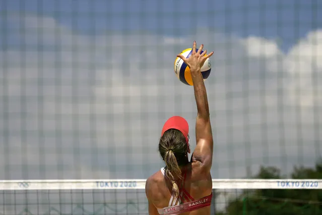 Heather Bansley, from Canada, practices during women's beach volleyball practice at the 2020 Summer Olympics, Monday, July 19, 2021, in Tokyo. (Photo by Charlie Riedel/AP Photo)