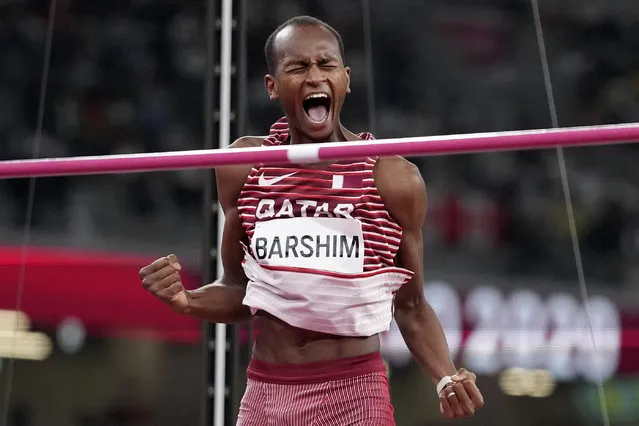 Mutaz Barshim, of Qatar, reacts in the final of the men's high jump at the 2020 Summer Olympics, Sunday, August 1, 2021, in Tokyo. (Photo by Matthias Schrader/AP Photo)