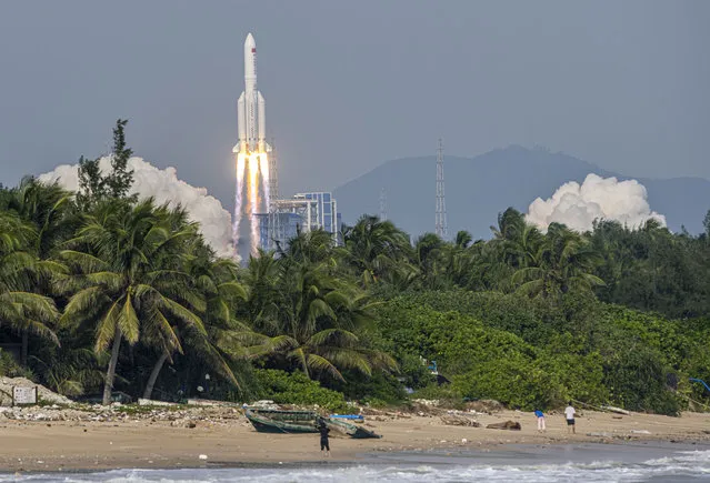 A Long March-5B Y4 rocket carrying China's lab module Mengtian blasts off from the Wencheng Spacecraft Launch Site on October 31, 2022 in Wenchang, Hainan Province of China. Mengtian, the second lab module of China's space station, was successfully launched into space in Hainan on Monday. (Photo by Yuan Chen/VCG via Getty Images)